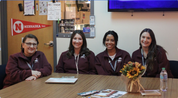 North Star counselors and social workers pose in the counseling center office. 